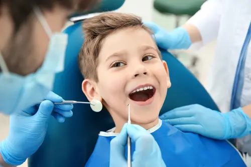 kid at dentist