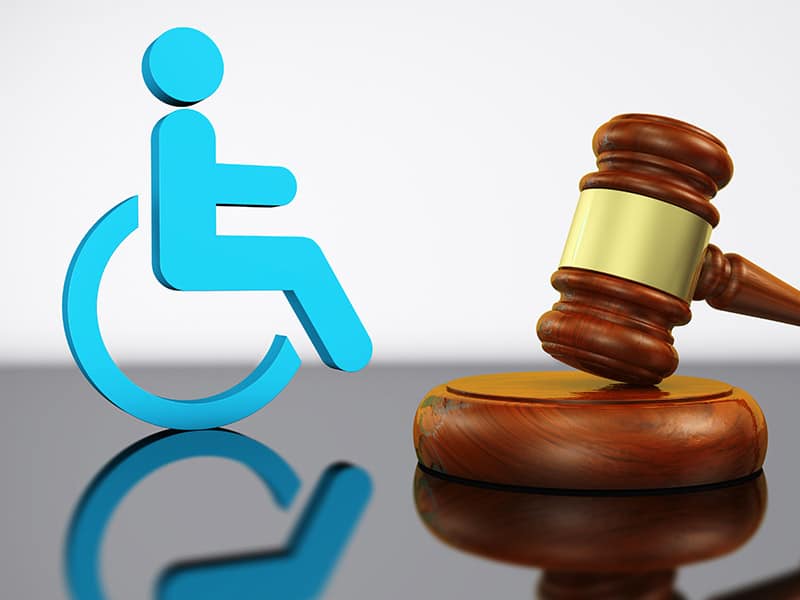 Handicap symbol next to judge's gavel